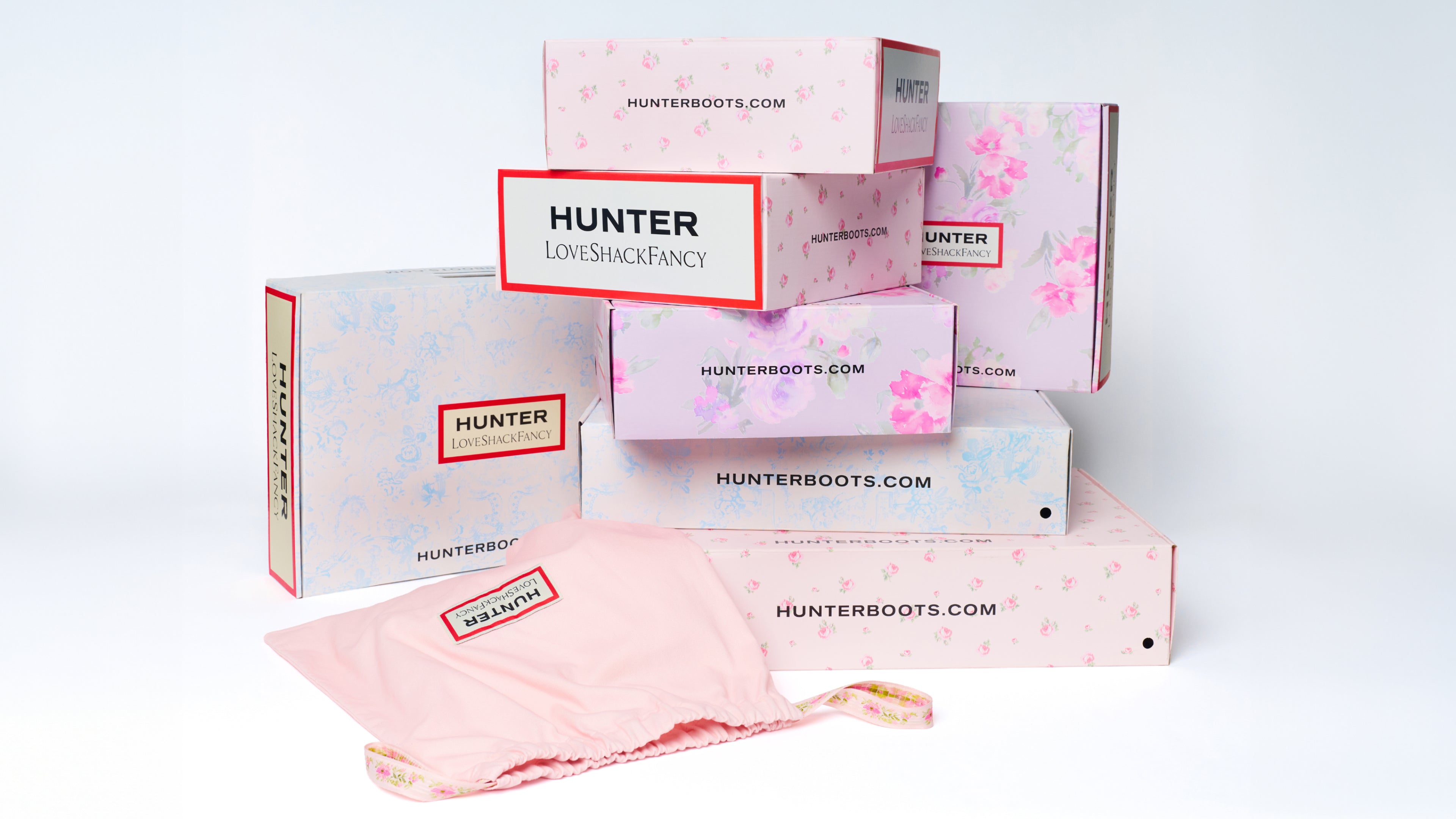 Hunter x LoveShackFancy gift packaging and pink accessories