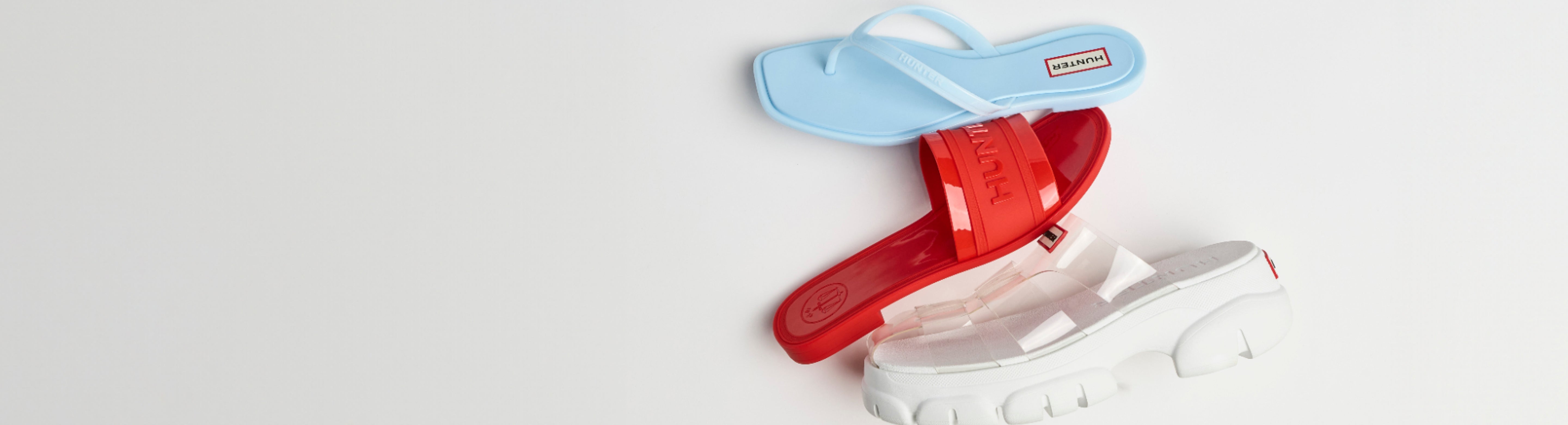 Hunter jelly sandals in blue, red, and white