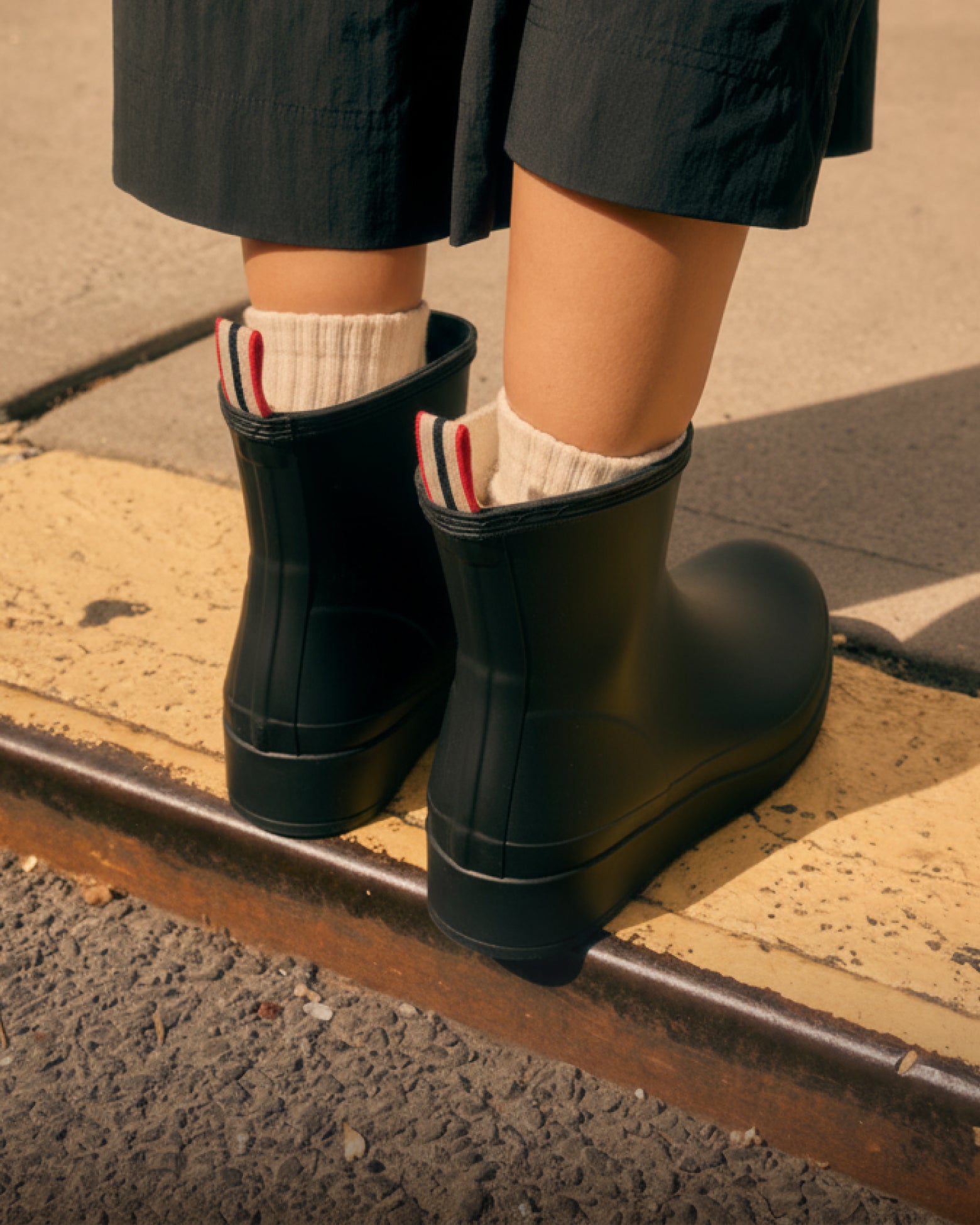 Promotional banner featuring women's boots
